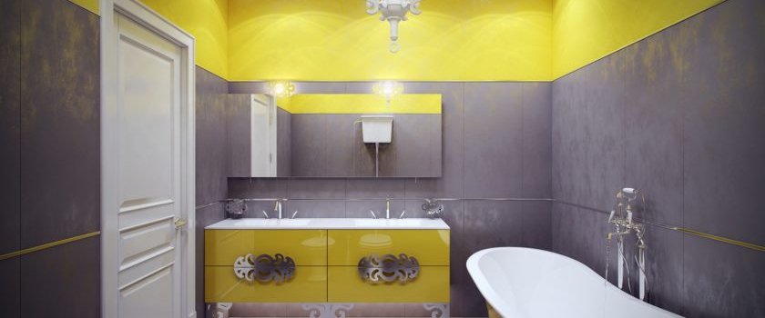 Pelēka ar dzeltenu vannas istabu.